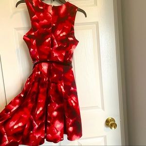 Red fit and flare dress by Eva Longoria